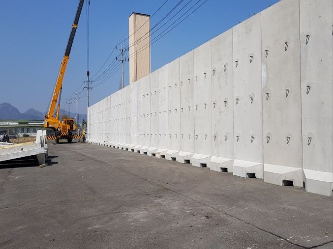 Precast concrete barrier wall installation at Kimhae Air Base