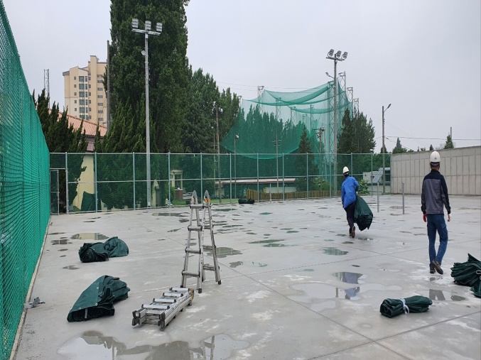 Tennis court base compaction, Camp Walker