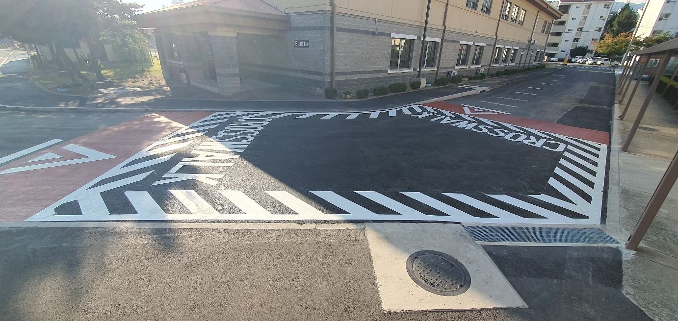 Repaired road and crosswalk, Camp George