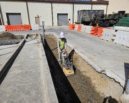 Trench for storm and sewer line separation, Camp Walker